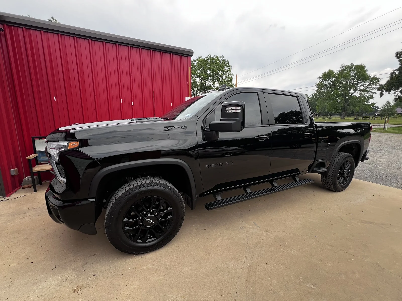 Tinted black Chevy Silverado finished at Scott’s Tint and Graphics